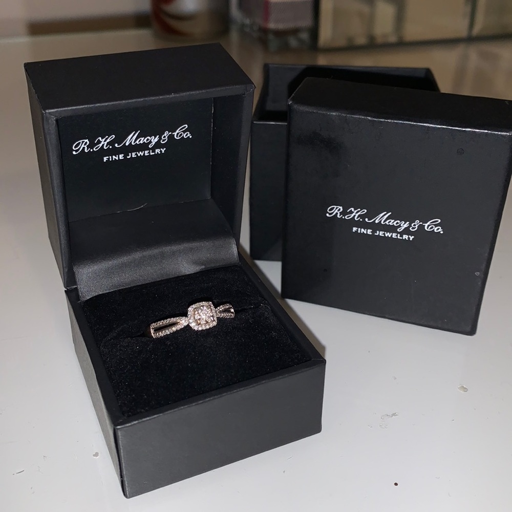 Woman’s diamond cluster promise ring (1/6 c.t t.w) in Sterling silver